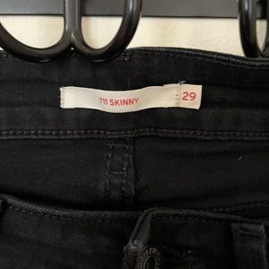 Levi’s 7/11 skinny black jeans.